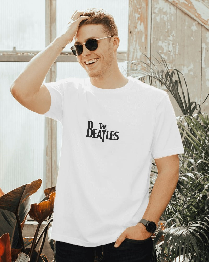 Beatles-themed t-shirt from Nitorious Atelier, featuring a bold and artistic graphic of the iconic band members. Made from premium cotton for comfort and durability, this t-shirt showcases a perfect blend of music and fashion.