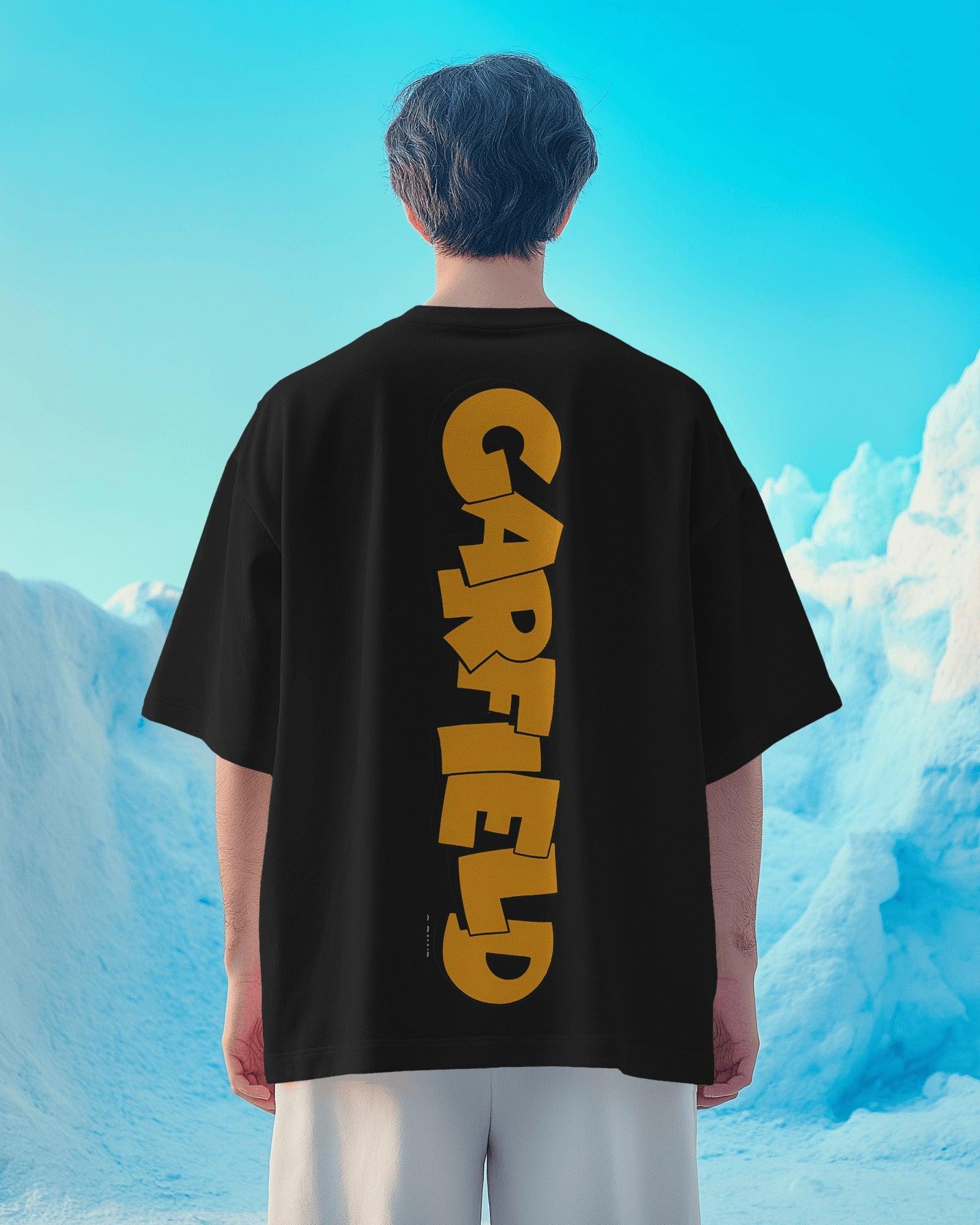 Black oversized t-shirt featuring a bold Garfield graphic print. Made from premium cotton, this t-shirt offers a relaxed fit, soft comfort, and a stylish streetwear vibe