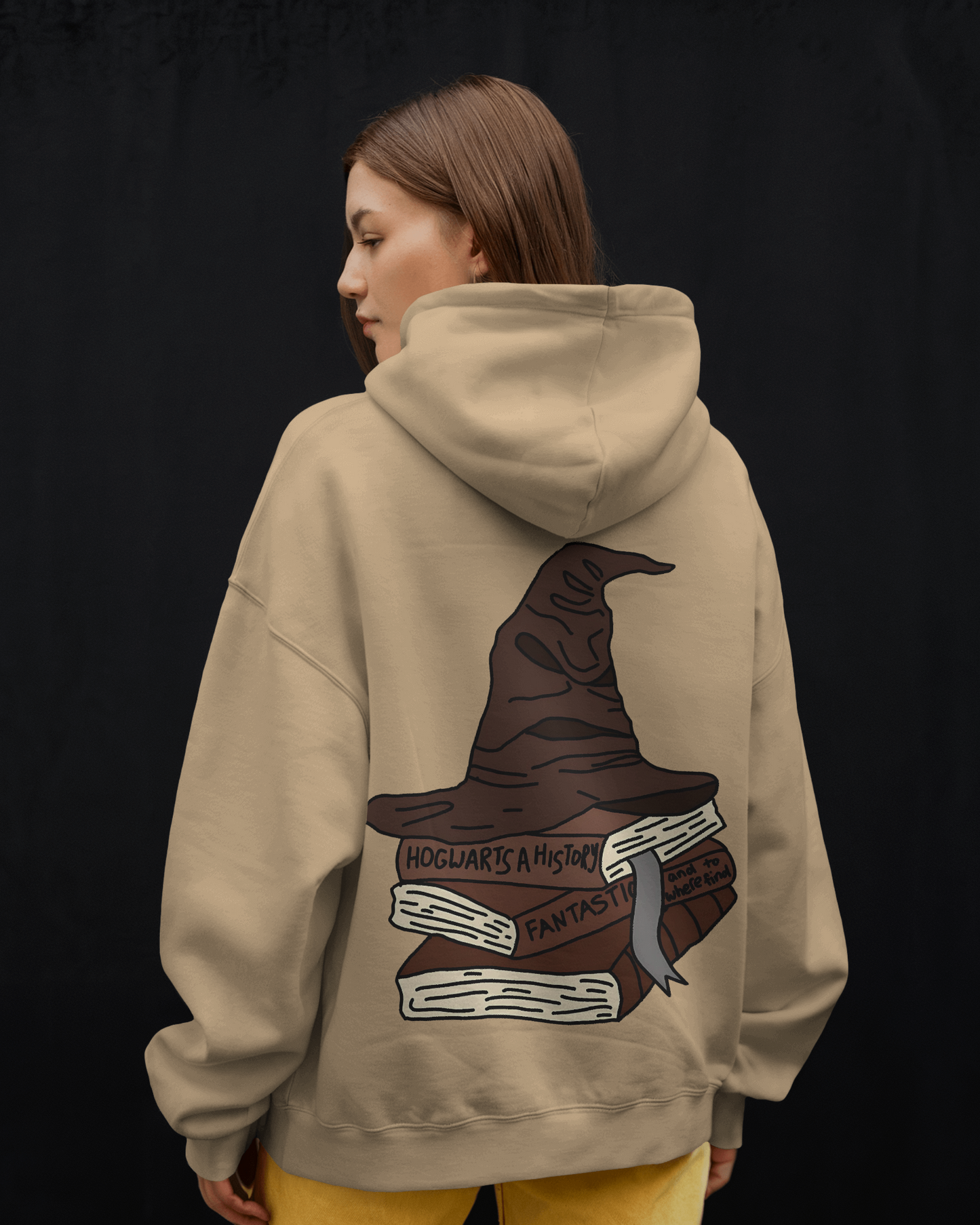 Beige luxe sweatshirt from Nitorious Atelier featuring a unique Sorting Hat-inspired design. Made from high-quality cotton fleece, this soft and cosy sweatshirt is ideal for fans of magical worlds and classic, stylish comfort.