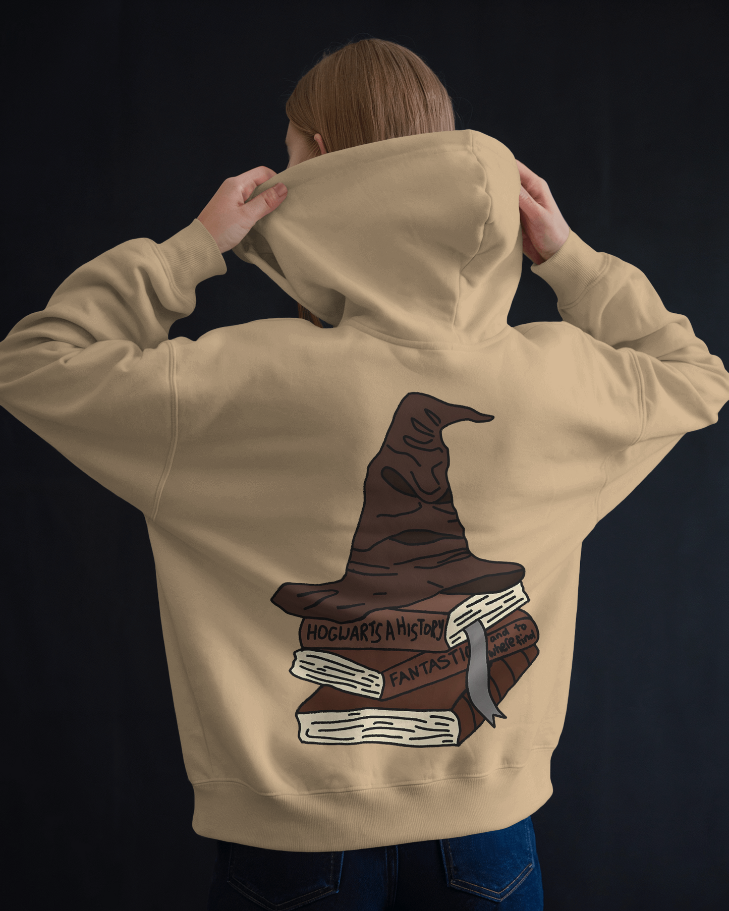 Beige luxe sweatshirt from Nitorious Atelier featuring a unique Sorting Hat-inspired design. Made from high-quality cotton fleece, this soft and cosy sweatshirt is ideal for fans of magical worlds and classic, stylish comfort.