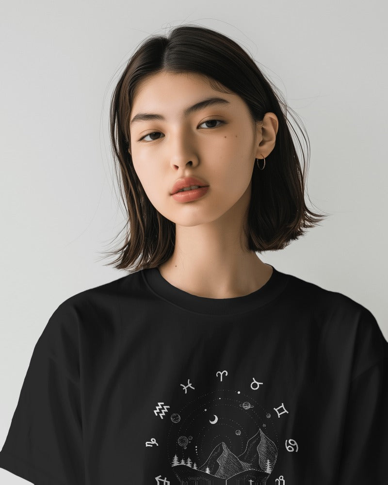 Black oversized t-shirt from Nitorious Atelier featuring a detailed topographic print. Made from premium cotton, this stylish piece offers a comfortable and trendy fit.