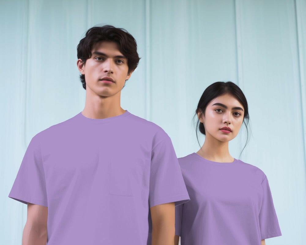 Model wearing a Nitorious Atelier Lavender Oversized Tee, featuring a relaxed fit and premium 220 gsm cotton fabric. The t-shirt showcases a soft lavender color, perfect for a stylish and comfortable look.