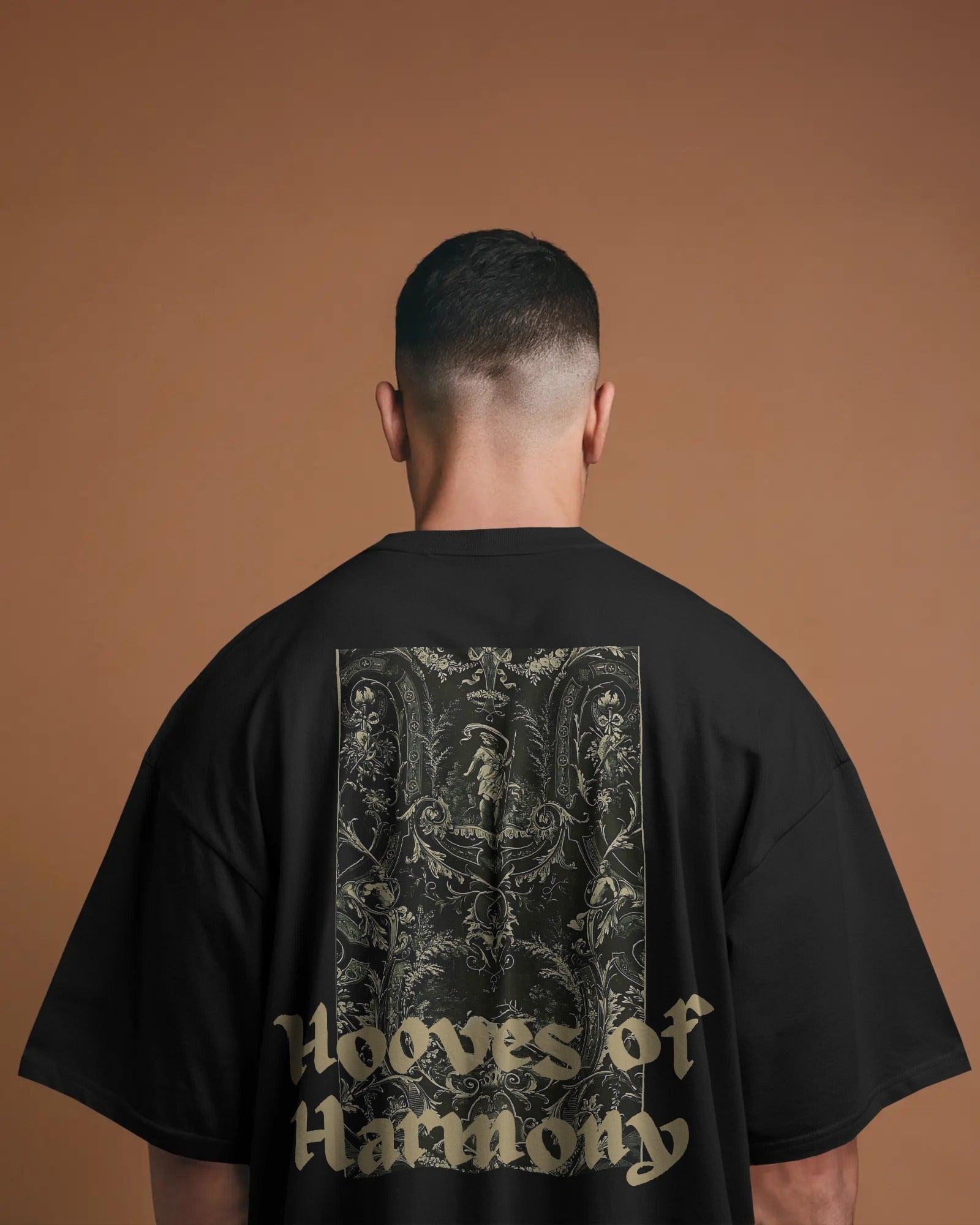Kilin Harmony Black Oversized T-shirt from Nitorious Atelier featuring a bold harmony-themed graphic. Made from premium cotton for all-day comfort and an elevated streetwear look.