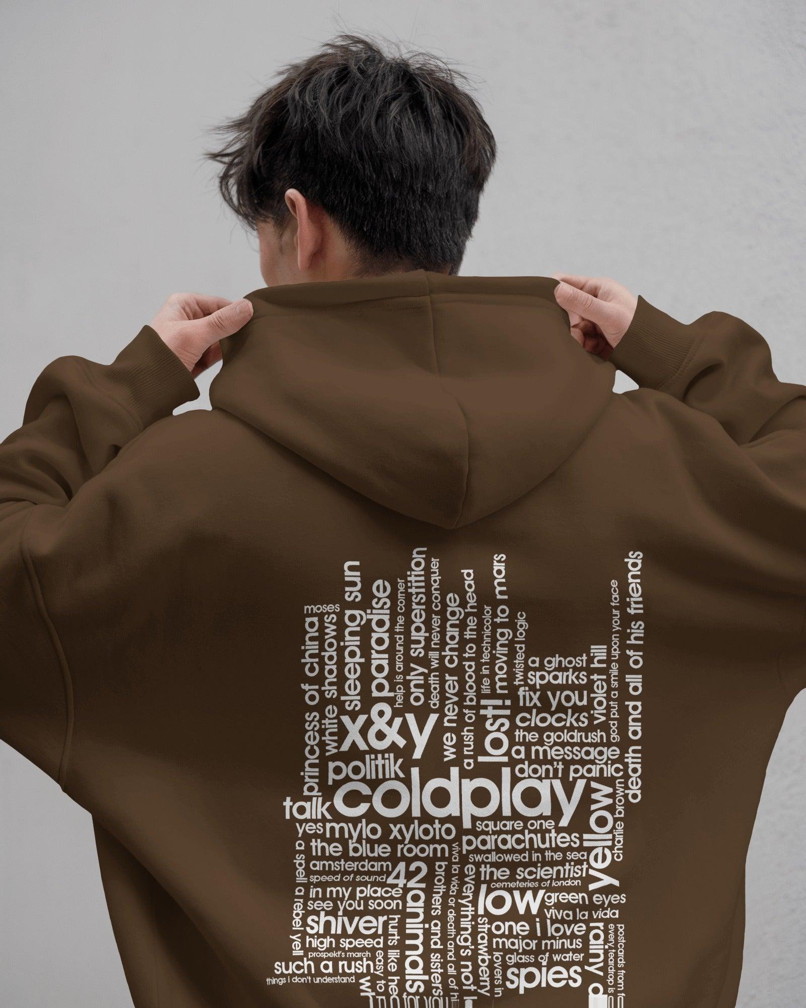Brown Coldplay hoodie from Nitorious Atelier featuring a comfortable and stylish design. Made from premium cotton fleece, this hoodie ensures warmth and durability, perfect for fans of Coldplay and casual fashion.