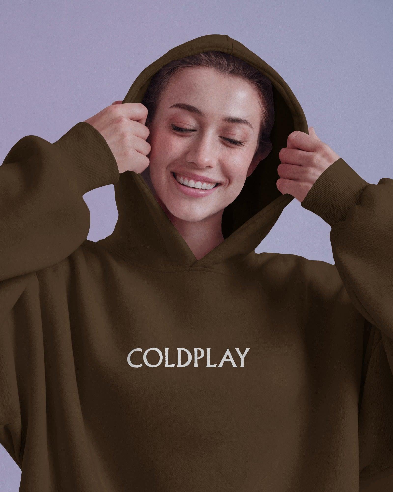 Brown Coldplay hoodie from Nitorious Atelier featuring a comfortable and stylish design. Made from premium cotton fleece, this hoodie ensures warmth and durability, perfect for fans of Coldplay and casual fashion.