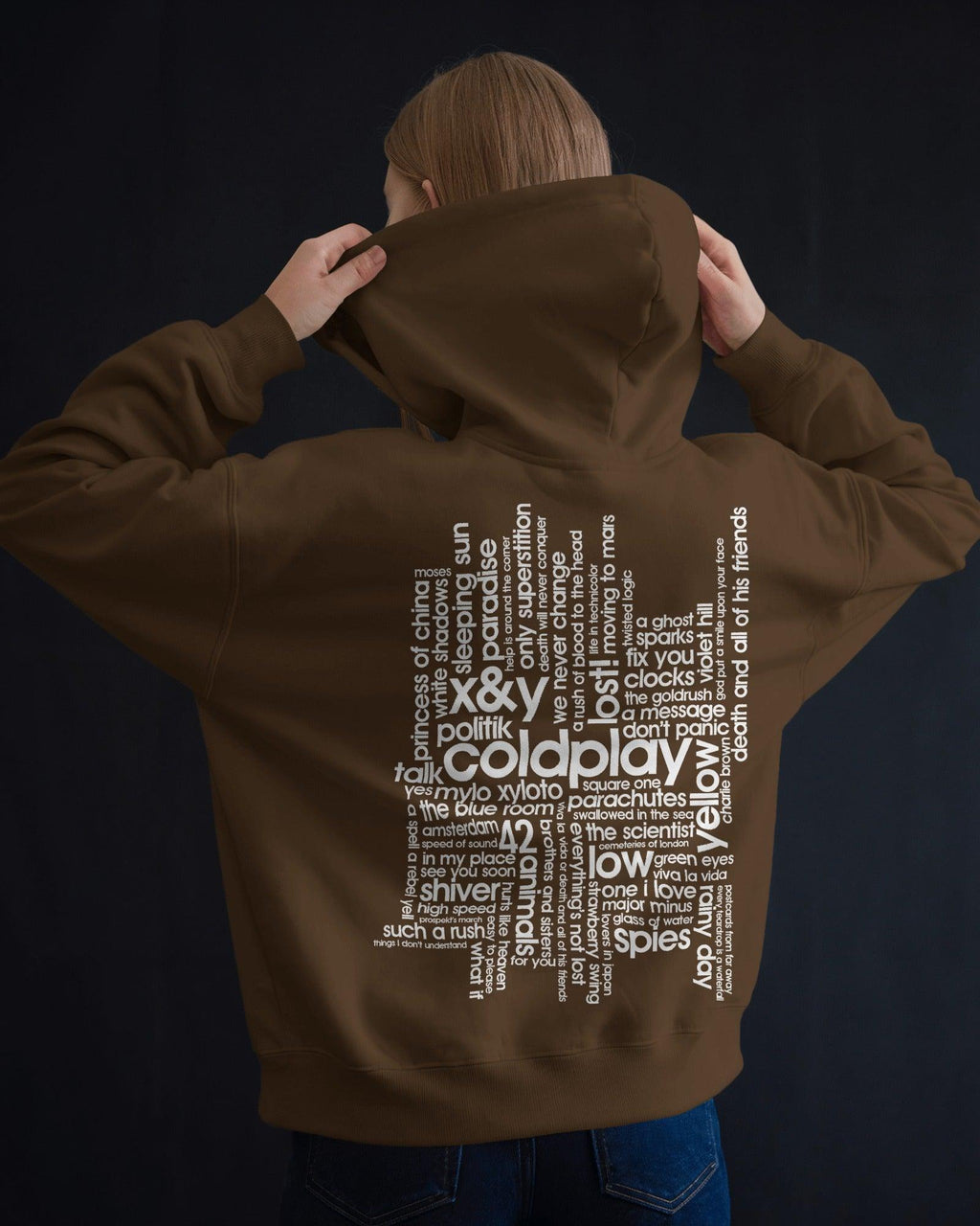 Brown Coldplay hoodie from Nitorious Atelier featuring a comfortable and stylish design. Made from premium cotton fleece, this hoodie ensures warmth and durability, perfect for fans of Coldplay and casual fashion.