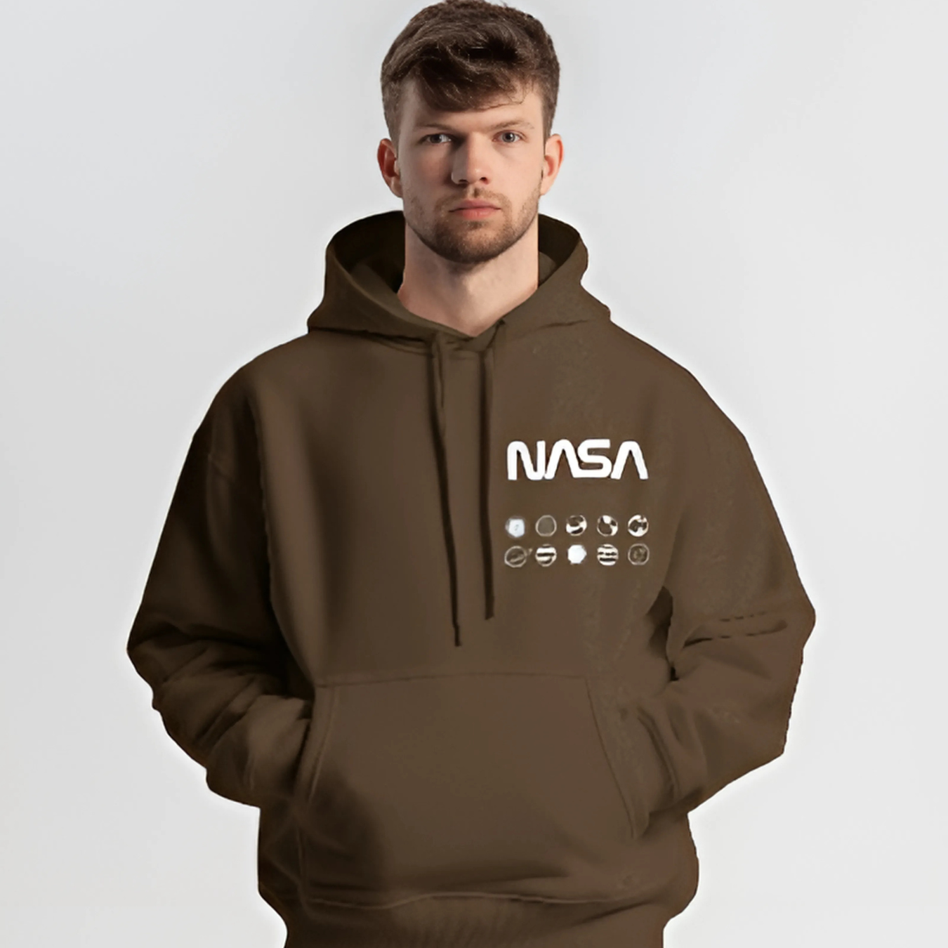 NASA brown hoodie from Nitorious Atelier crafted from premium cotton fleece. This cozy hoodie showcases the iconic NASA logo on the front, combining a sleek design with a comfortable, relaxed fit. Ideal for everyday wear and space lovers alike.