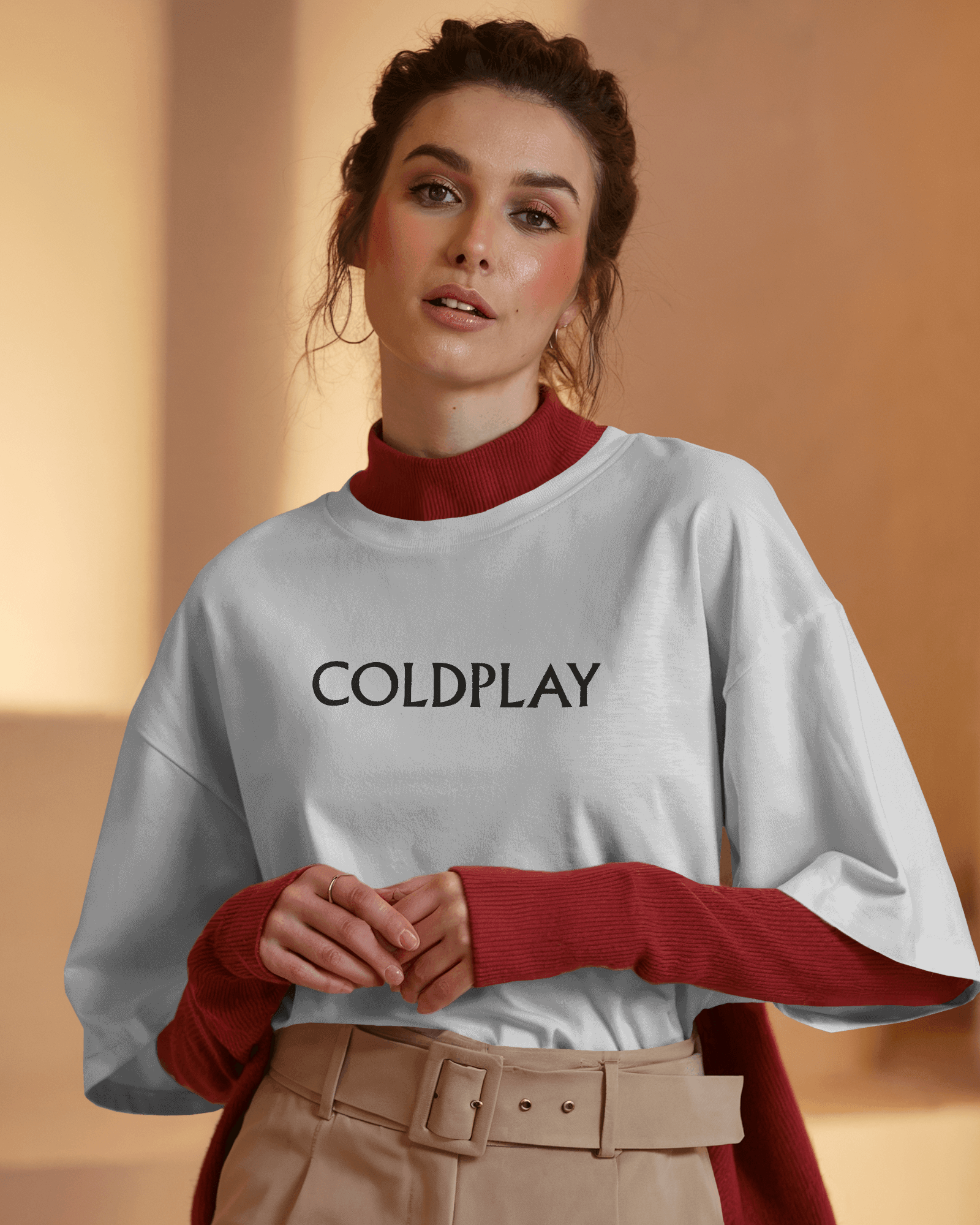 White t-shirt from Nitorious Atelier featuring a vibrant Coldplay-inspired graphic print. Crafted from premium cotton, this t-shirt offers a comfortable fit and a stylish look for music enthusiasts.