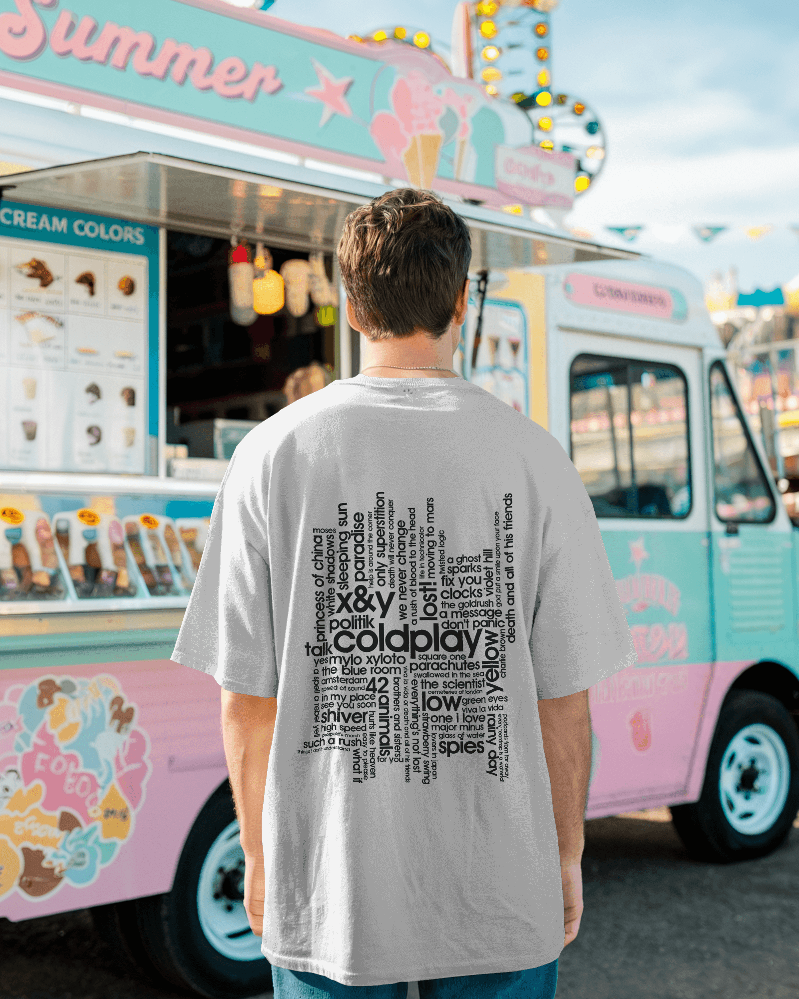 White t-shirt from Nitorious Atelier featuring a vibrant Coldplay-inspired graphic print. Crafted from premium cotton, this t-shirt offers a comfortable fit and a stylish look for music enthusiasts.