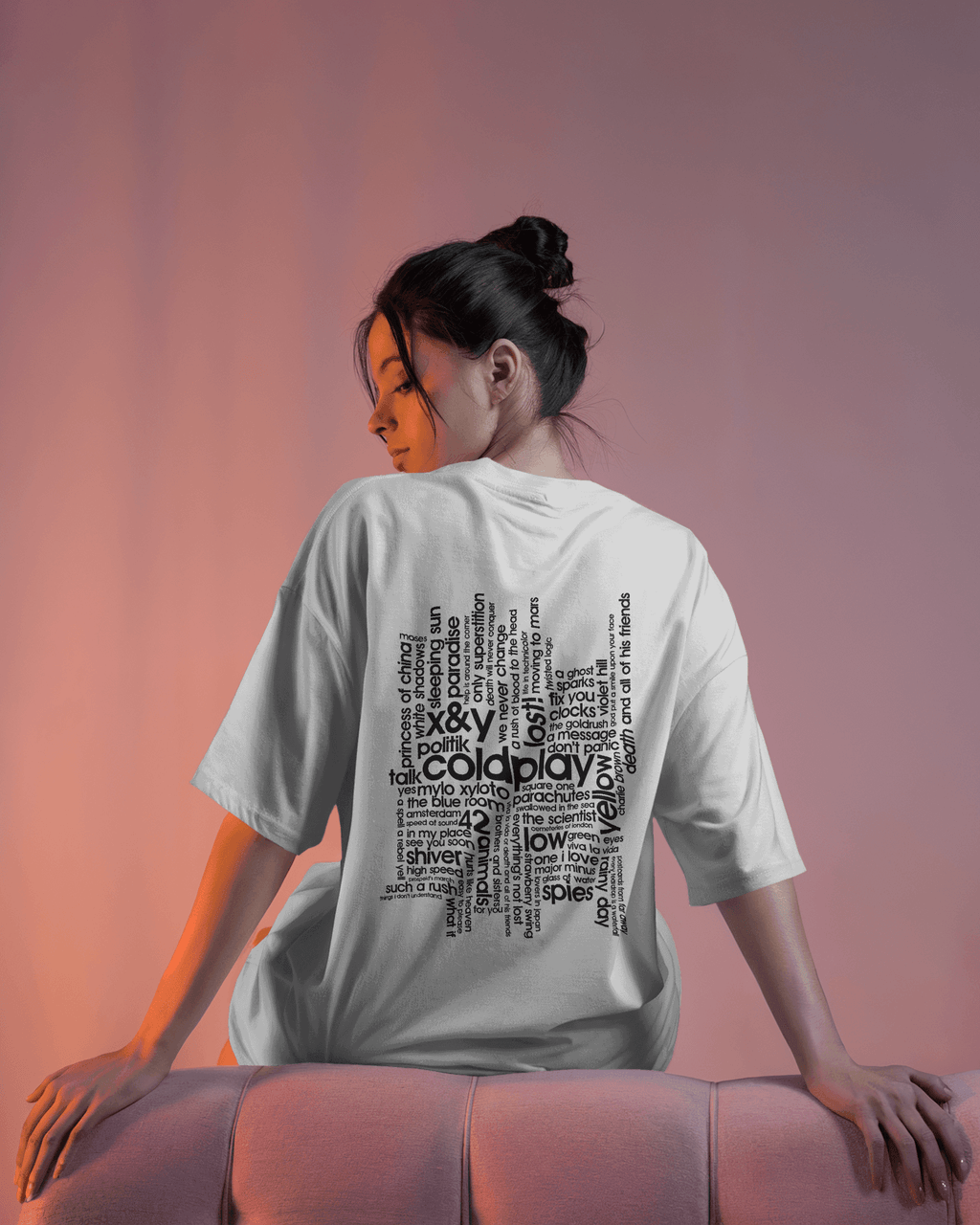 White t-shirt from Nitorious Atelier featuring a vibrant Coldplay-inspired graphic print. Crafted from premium cotton, this t-shirt offers a comfortable fit and a stylish look for music enthusiasts.