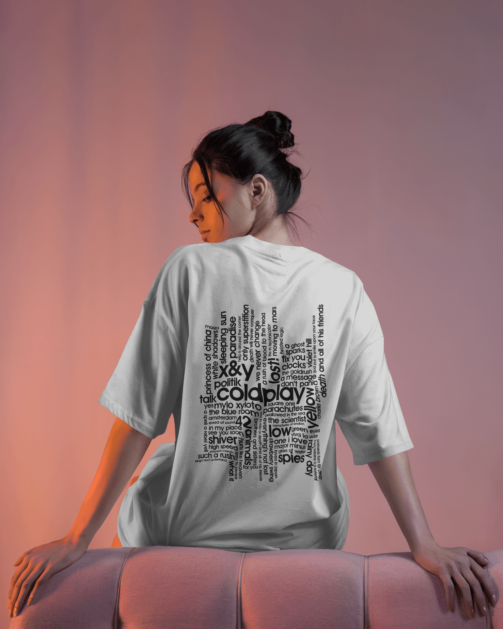 White t-shirt from Nitorious Atelier featuring a vibrant Coldplay-inspired graphic print. Crafted from premium cotton, this t-shirt offers a comfortable fit and a stylish look for music enthusiasts.