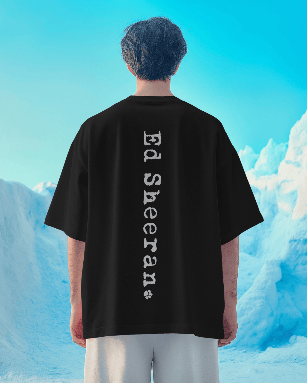 Ed Sheeran Song Black Oversized T-shirt by Nitorious Atelier. This black t-shirt showcases a striking song-inspired graphic, offering a tribute to Ed Sheeran's music. Made from premium cotton, it combines comfort with a trendy oversized fit, ideal for music lovers and casual wear enthusiasts.