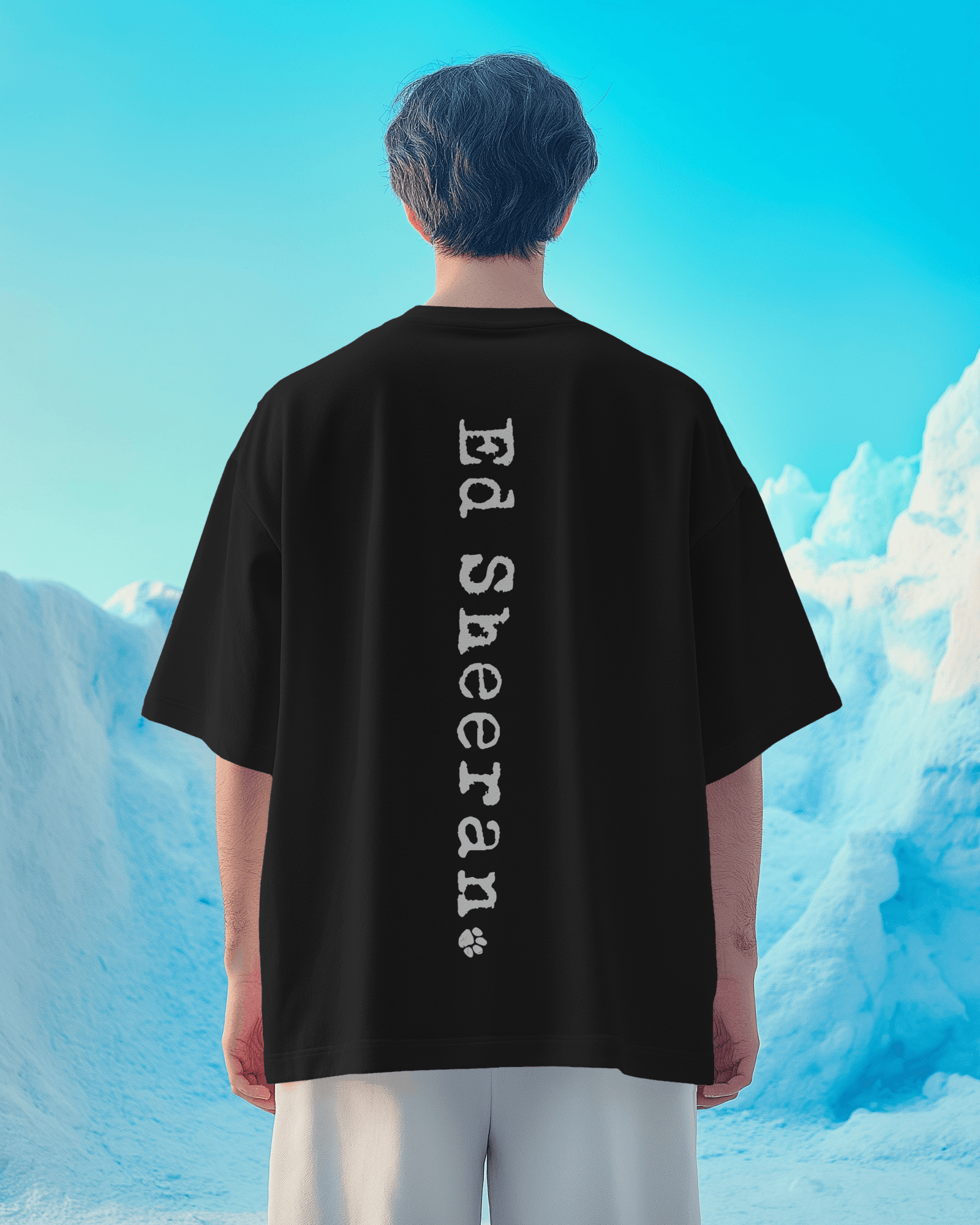 Ed Sheeran Song Black Oversized T-shirt by Nitorious Atelier. This black t-shirt showcases a striking song-inspired graphic, offering a tribute to Ed Sheeran's music. Made from premium cotton, it combines comfort with a trendy oversized fit, ideal for music lovers and casual wear enthusiasts.