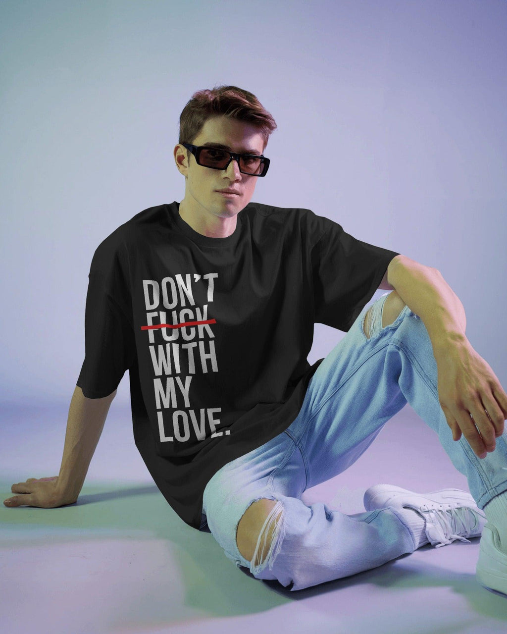 Ed Sheeran Song Black Oversized T-shirt by Nitorious Atelier. This black t-shirt showcases a striking song-inspired graphic, offering a tribute to Ed Sheeran's music. Made from premium cotton, it combines comfort with a trendy oversized fit, ideal for music lovers and casual wear enthusiasts.