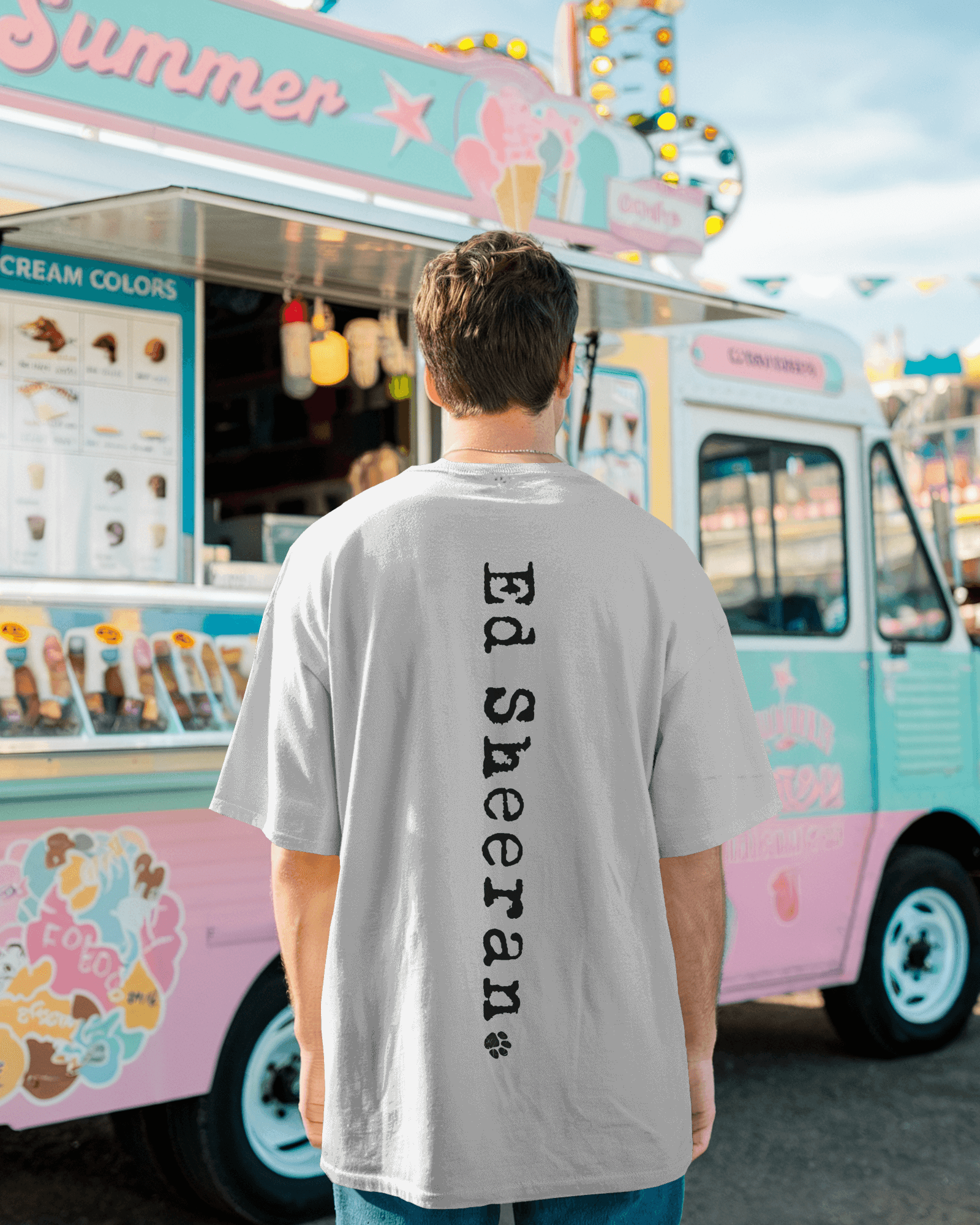 Ed Sheeran Guitar Photo White Oversized T-shirt by Nitorious Atelier. Featuring a striking photo of Ed Sheeran with his guitar, this white oversized t-shirt is crafted from premium cotton, offering ultimate comfort and a stylish fit for music fans and casual wear lovers.