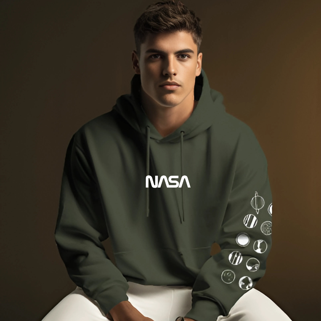 NASA green hoodie from Nitorious Atelier made with premium cotton fleece. This hoodie features a bold NASA logo on the front, offering both style and comfort with its soft, warm fabric and relaxed fit. Perfect for casual wear and space enthusiasts.