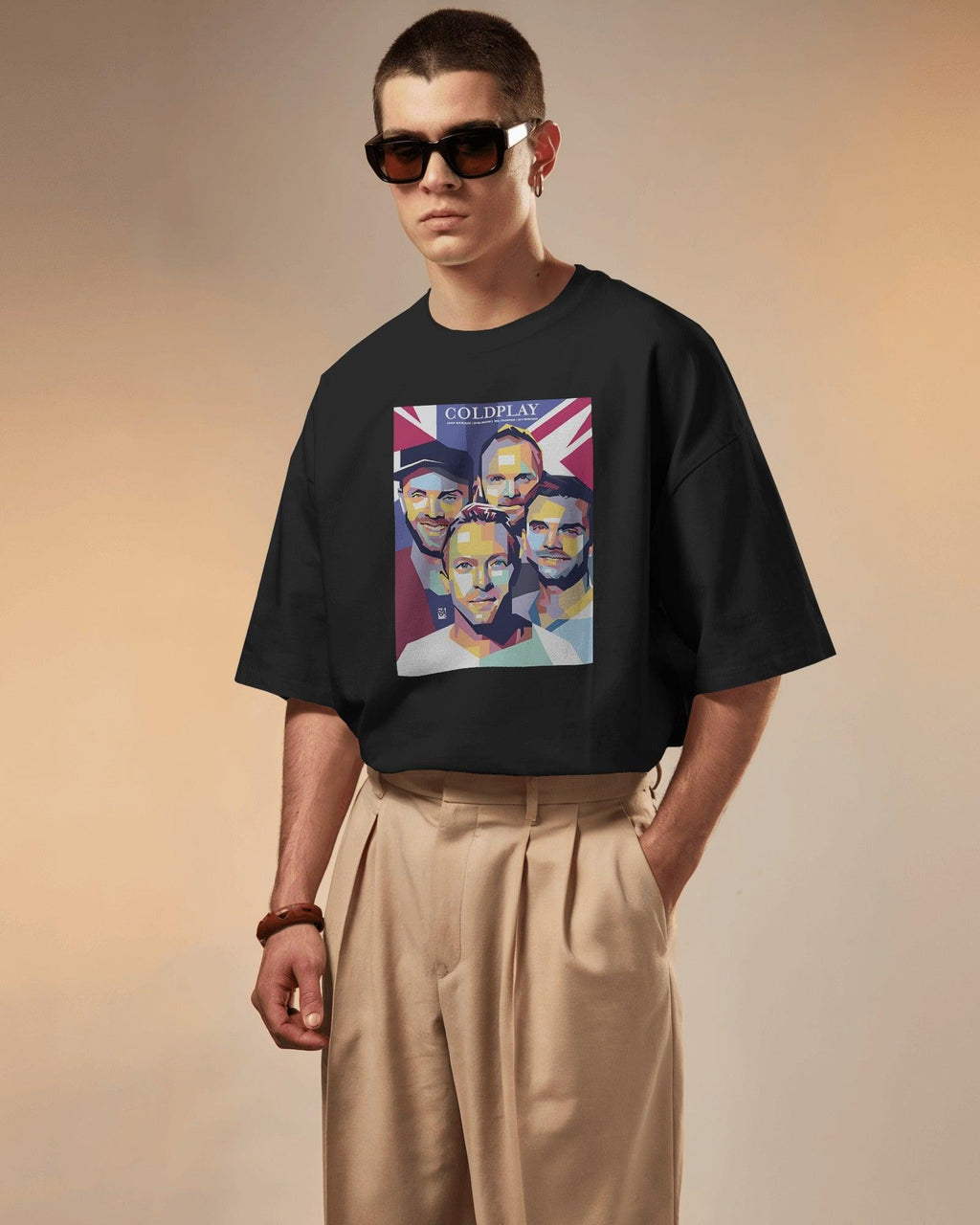 Black t-shirt from Nitorious Atelier featuring a bold Coldplay-inspired graphic print. Made from premium cotton, this t-shirt combines style and comfort, perfect for music lovers.