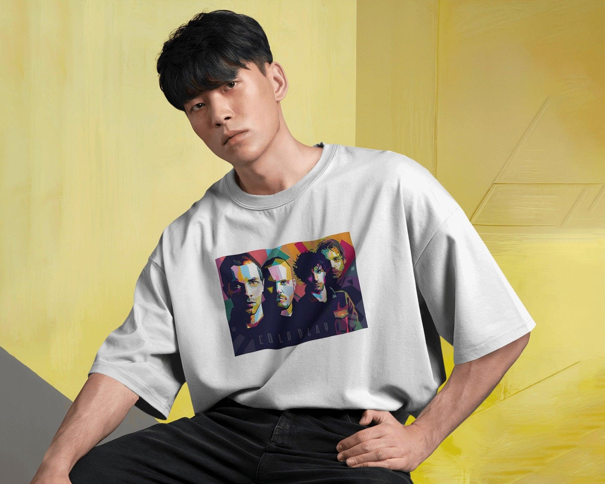 Nitorious Atelier Coldplay t-shirt featuring a vibrant, artistic design inspired by the band's iconic album art. Made from premium cotton, this regular fit t-shirt offers comfort, durability, and a stylish way to showcase your love for Coldplay.