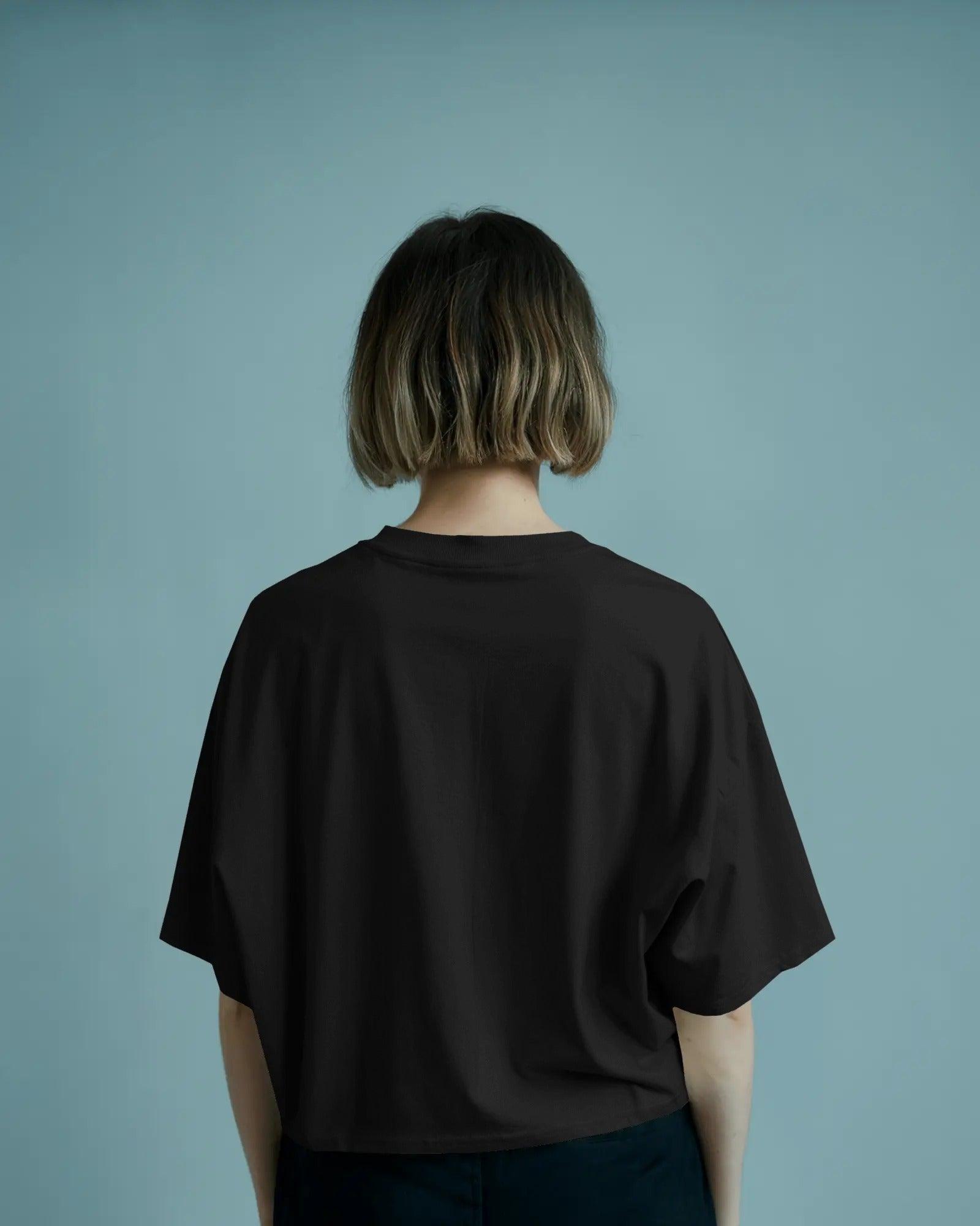 Black oversized "Only Fans" t-shirt from Nitorious Atelier, featuring bold white typography on premium cotton. Designed for comfort and statement streetwear style.