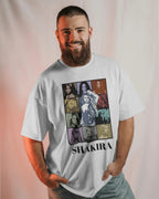 Man wearing a white t-shirt with Shakira graphic design on a plain background