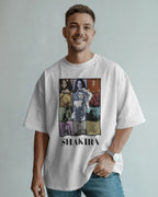 Man wearing a white t-shirt with Shakira graphic design on a plain background