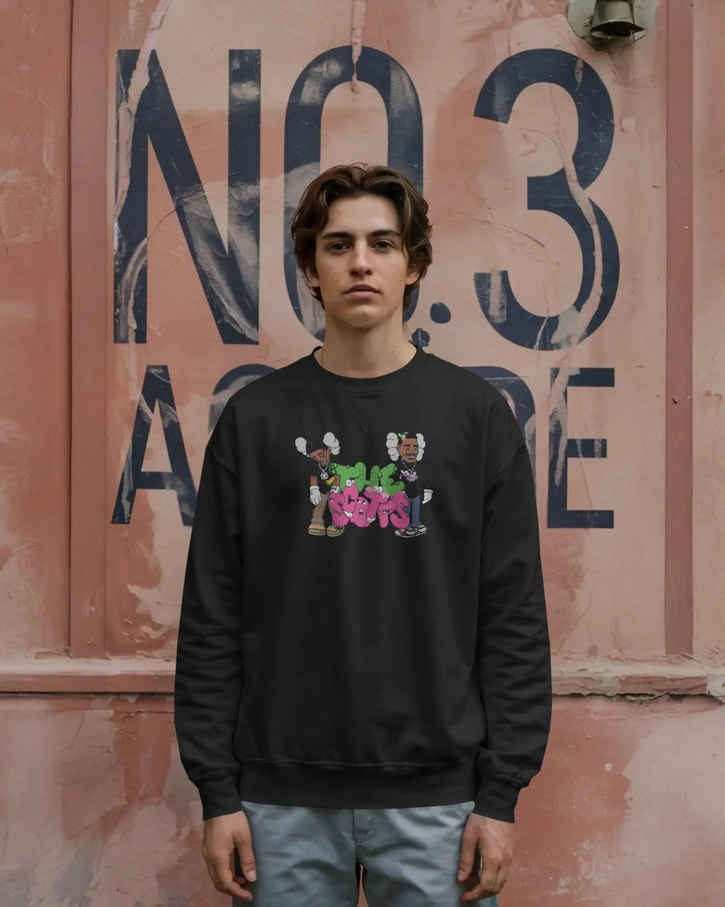 Black Travis Scott sweatshirt featuring bold graphic elements inspired by the rapper’s signature style. Made from premium cotton blend for comfort and streetwear appeal. Ideal for fans of hip-hop fashion and statement looks.