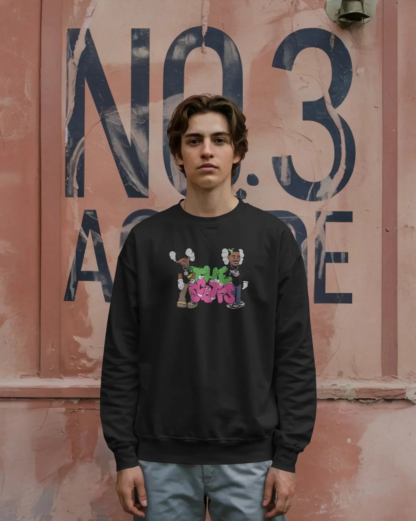 Black Travis Scott sweatshirt featuring bold graphic elements inspired by the rapper’s signature style. Made from premium cotton blend for comfort and streetwear appeal. Ideal for fans of hip-hop fashion and statement looks.