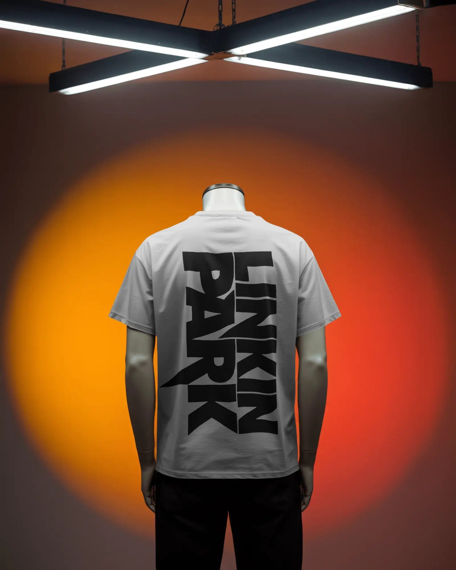 Linkin Park Signature Legacy Oversized White T-Shirt with album art collage and band signatures worn by model with futuristic sunglasses